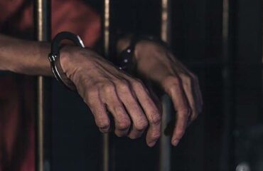 Free person with handcuffed in prison public domain people CC0 p